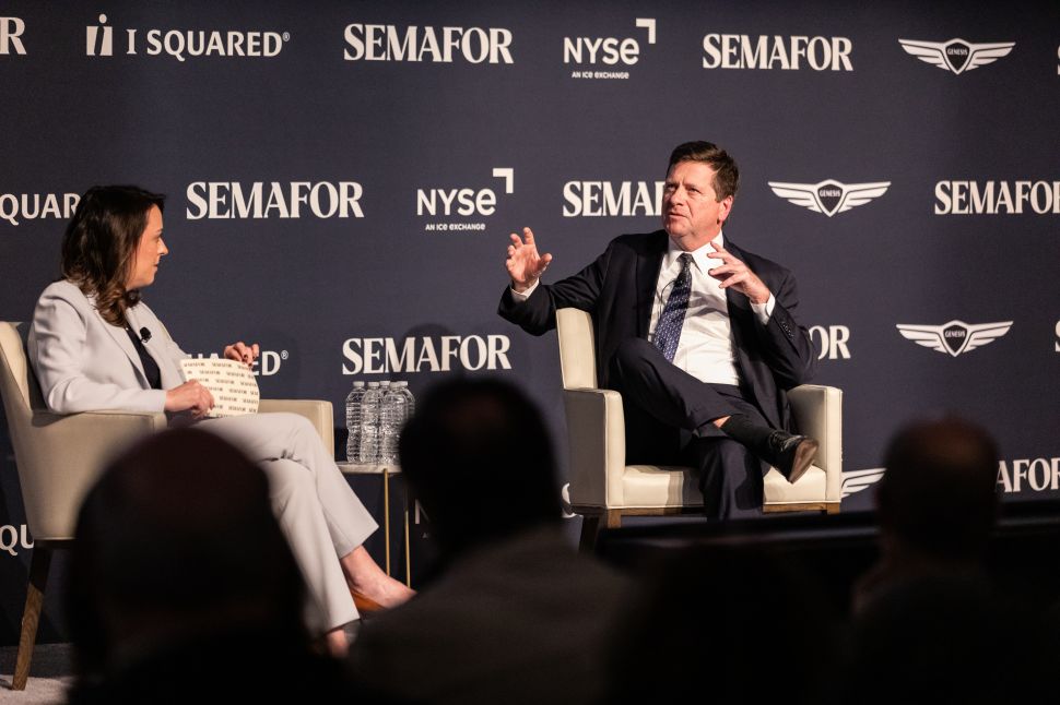 Liz Hoffman and Jay Clayton onstage for a fireside chat.