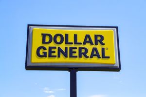 Yellow sign reading 'Dollar General.'