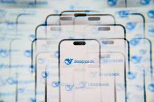 A digital composition featuring multiple overlapping smartphone screens displaying the DeepSeek logo, symbolizing the rapid emergence and proliferation of the Chinese AI company's technology.