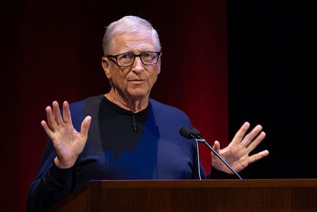 Bill Gates in a blue sweater.