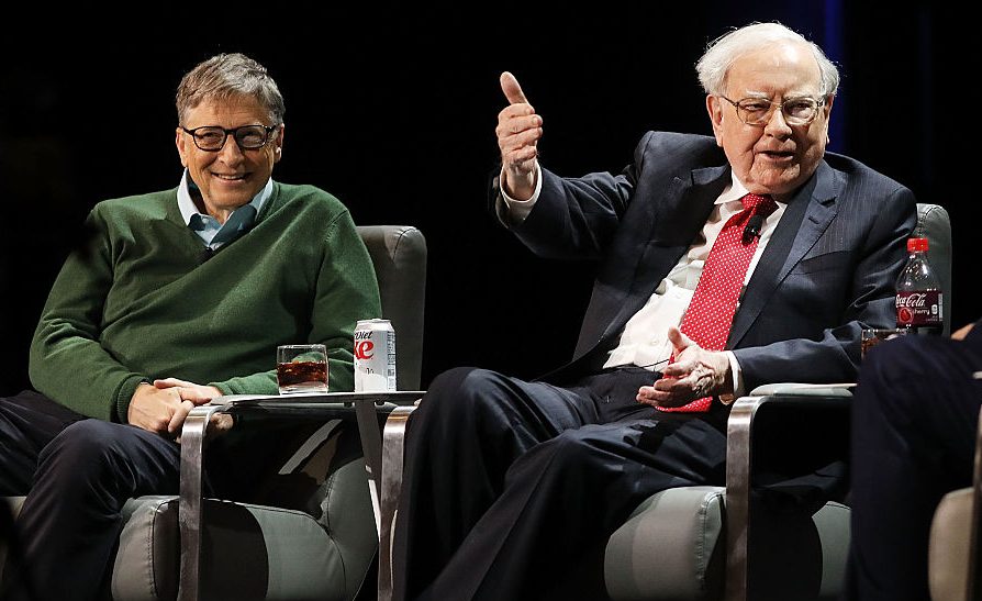 Bill Gates and Warren Buffett sitting next to each other